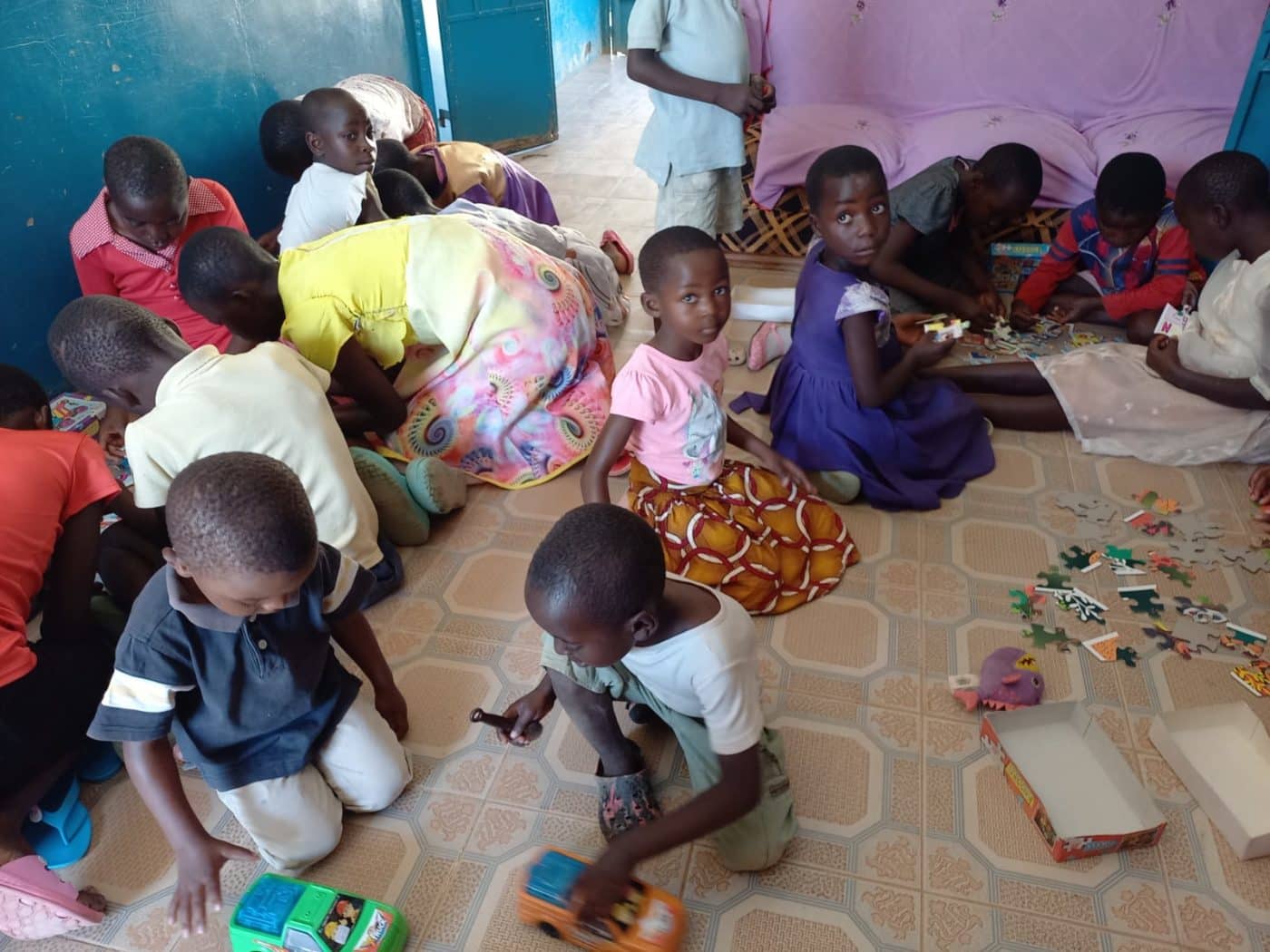 Little children playing with toys