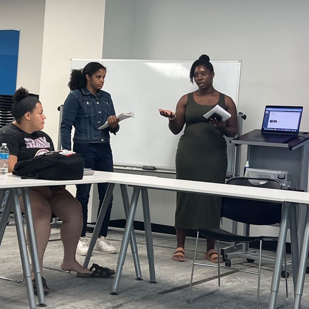Students engaging in discussion during the Sister Thea Bowman Foundation Summer Symposium