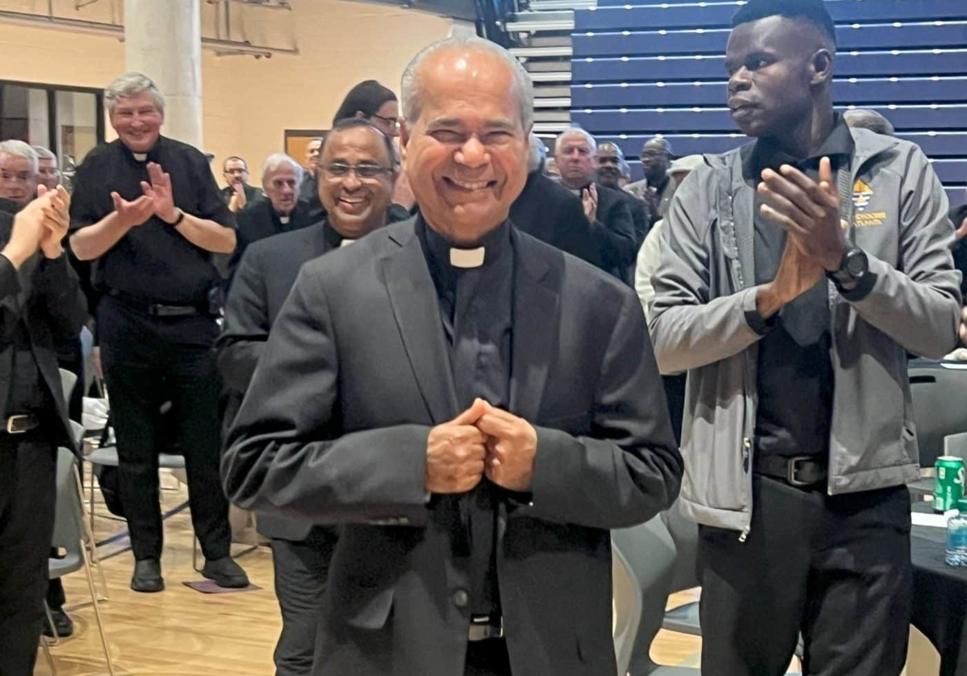 Fr. Joseph Mullakkara, MSFS with his brother priests applauding his 50 years of priesthood
